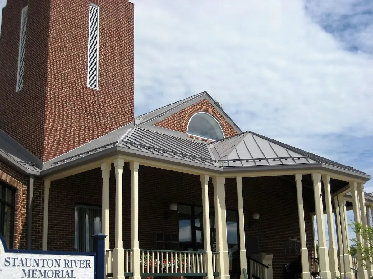 Skilled roofing craftsmen working on a residential roof in Chattanooga